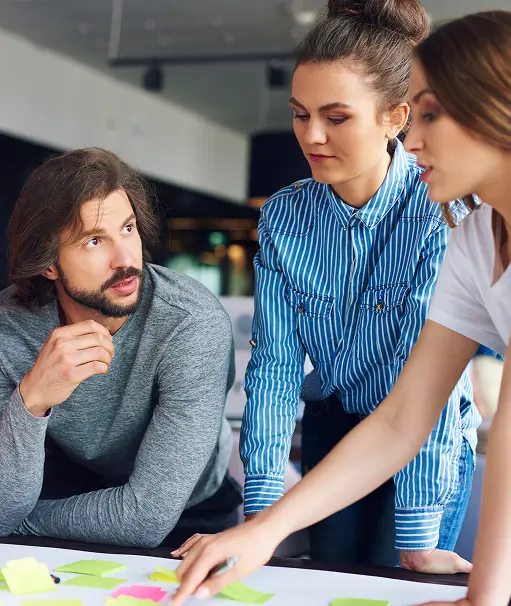 young coworkers sharing concepts together